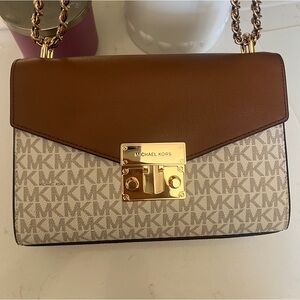 Micheal Kors brand new purse authentic with tags.